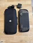 Valve Steam Deck 256GB Lcd Charger, Case Travel Folio Used. Price: $474.99.