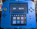 Nintendo 2DS Blue Handheld Console Usb Port Added, 128GB Of Storage Used. Price: $295.00.