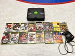 Microsoft Original Xbox Console W/ Wired Controller & Mixed Games Lot Used. Price: $80.00.