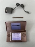 Nintendo Lite Handheld USG-001 (tested Working) With Charger Stylus Read Used. Price: $55.00.