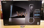 New Nintendo Wii With Sports + Resort Black Console System Bundle. Price: $549.99.