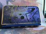 New Nintendo 3DS Xl Purple Galaxy Edition With Pokemon Game No Charger Used. Price: $500.00.