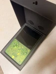 Analogue Pocket Limited Edition Transparent Green Handheld Console Open. Price: $500.00.