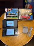 Nintendo Ds Lite USG-001 Cobalt Blue Black W/ Charger + Mario Used. Price: $100.00.