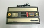 Mattel Intellivision Model 2609 Console And 20 Games New. Price: $129.95.