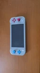 Nintendo Switch Lite 32GB Zacian & Zamazenta Limited Edition Console - Grey Usato. Price: $174.38.