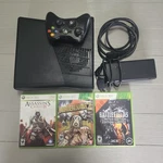 Microsoft Xbox 360 Black 1439 With Power Cable + Controllers Games Used. Price: $68.63.