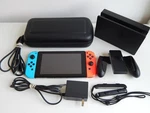 Nintendo Switch 32GB System Console Neon Red & Blue Joy Cons, Dock Case Used. Price: $159.95.