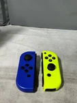 +nintendo Switch Joy-con (l/r) Pair Blue And Neon Yellow Used. Price: $45.00.