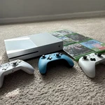 Microsoft Xbox One White Console Bundle, 3 Controllers, Plus Games Used. Price: $269.99.
