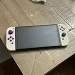 Nintendo Switch Console White Joy-con Wi-fi Capability Handheld System Used. Price: $150.00.