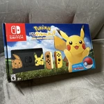 Nintendo Switch Mon Let Go Pikachu Limited Edition Console With Pokeball Used. Price: $399.95.