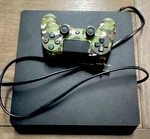 Sony Playstation PS4 CUH-2215B Console W/ Controller & Video Games Lot Used. Price: $150.00.
