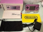 Excellent Nintendo Game Boy Micro Purple With Ac Charger Open. Price: $340.00.