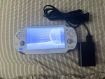 Sony Playstation Vita PCH-1001 Handheld System White/games Memory Cards Used. Price: $180.00.