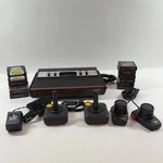 Atari 2600 Video Console 637.75005 And 12 Games Used. Price: $99.99.