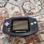 Nintendo Game Boy Advance AGB-001 Handheld System, Purple, Used. Price: $70.00.
