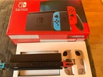 Nintendo Switch Handheld Console - 64GB Usato. Price: $318.25.