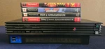 Sony Playstation 2 System Bundle - 4 Games, Cables Controller & Memory Card Used. Price: $129.99.