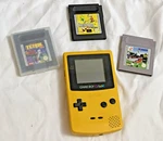 Nintendo Gameboy Color Handheld Console Vintage 1987 Original + Cartridges Used. Price: $130.00.