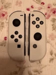 Official Nintendo Switch Oled White Joy-con & R HAC-015/HAC-016 Used. Price: $32.00.