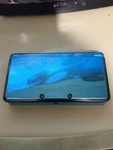 Nintendo 3DS Blue Handheld Console W/ 6 Games Used. Price: $215.00.