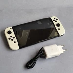 Nintendo Switch Oled Model HEG-001 Handheld Console 64GB White Usato. Price: $202.16.
