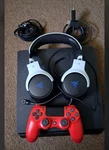 Sony Playstation 4 Slim 500GB Black W/ Red Controller, Razer Headset Used. Price: $115.00.