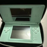 Nintendo Lite Handheld Console W/ Case Oem Stylus + Charger Aqau Tested Used. Price: $125.00.