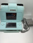 Nintendo Lite Handheld System Ice Blue With Charger Stylus Case Used. Price: $89.99.