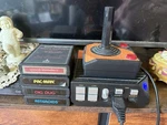Hyperkin Retron 77: Hd Gaming Console For Atari 2600 W/ 1 Joystick And 4 Games Used. Price: $100.00.
