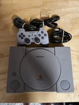 Sony Playstation Game Console Bundle Fat - Gray Controller And Power Cord PS1 Used. Price: $55.00.