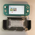 Nintendo Switch Lite Handheld Console - Turquoise Used. Price: $139.99.