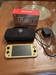 Nintendo Switch Lite Zelda Hyrule Edition Gold Handheld Console Used. Price: $180.00.