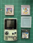 Nintendo Game Boy Color Clear + 3 Lot Super Mario Land 2 Bros Deluxe Bugs Used. Price: $200.00.