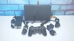 Black Sony Playstation PS2 Slim Console SCPH-70012 With Oem Controller & Wires Used. Price: $140.00.