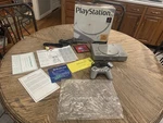 Sony Playstation SCPH-1001 Cib Console With Controller, Manuals, Cd Sampler Used. Price: $300.00.