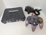 Nintendo NUS-001 N64 Console W/ Cables & Atomic Purple Controller Tested Used. Price: $85.00.