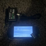 Sony PSP-1001 Black Console With Charger And 32MB Storage Used. Price: $80.00.