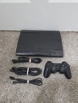 Sony Playstation 3 Super Slim 256GB Console With Controller And Cables Used. Price: $110.00.
