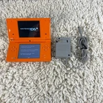 Nintendo Dsi Orange Handheld Console System TWL-001 Ntsc Tested Used. Price: $149.99.