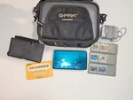 Nintendo 3DS W/ Case, Games, Cards, Charging Dock, & Carrying Lot Used. Price: $250.00.