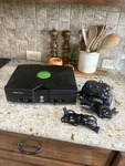 Original Microsoft Xbox Console Og With Cables/ Tested Works Used. Price: $120.00.