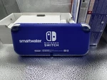 Nintendo Switch Lite Smart Water Console Purple Holiday Employee Gift Coca Cola Brand. Price: $1660.00.