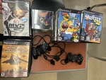 Sony Playstation 2 Slim Console Bundle Silver With Controllers, Cords & Game Used. Price: $700.00.