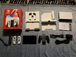 Nintendo Switch Oled, White Cib W/ 1TB Microsdxc Card Used. Price: $243.15.