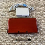 Nice Nintendo 3DS Handheld System - Flame Red With Stylus Charger Ver Used. Price: $179.10.