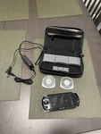 Sony PSP-3000 Black Tested W/ Mgs Portable Ops And Star Wars Battlefront + Case Used. Price: $169.00.