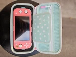Limited Edition Nintendo Switch Lite Animal Crossing: Isabelle Aloha Used. Price: $270.00.