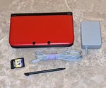 Nintendo 3DS Xl Red/black 4GB Hand-held Game System W/ac Adapters/stylus Used. Price: $255.00.